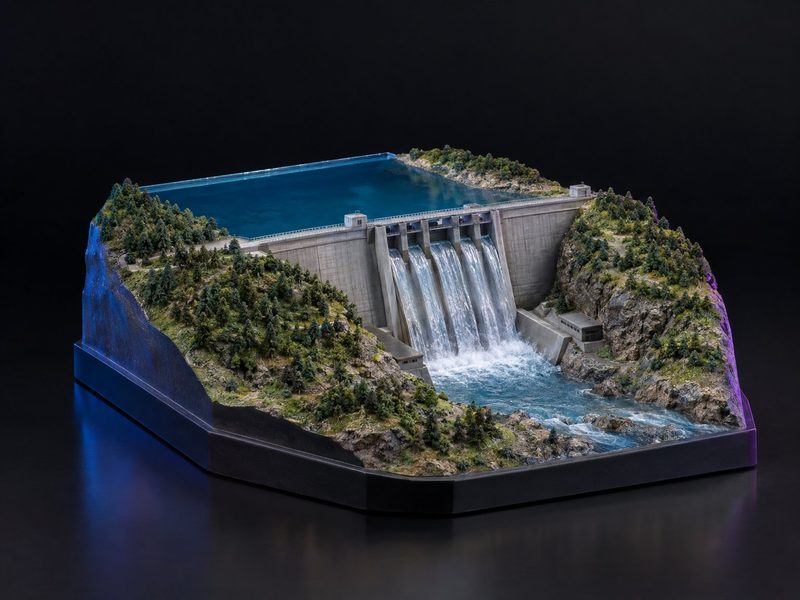 Concept render: Dam and spillway. A dam with water pouring down its spillway in clear resin.
